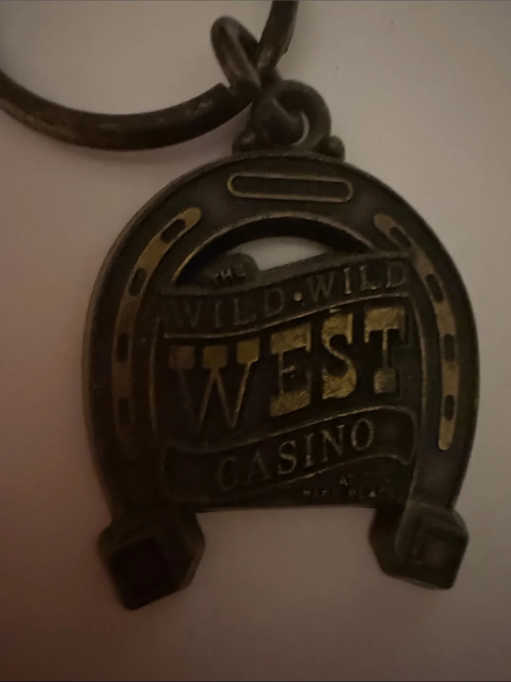 Wild Wild West Casino Las Vegas NV Horseshoe Metal Keychain Vintage Souvenir